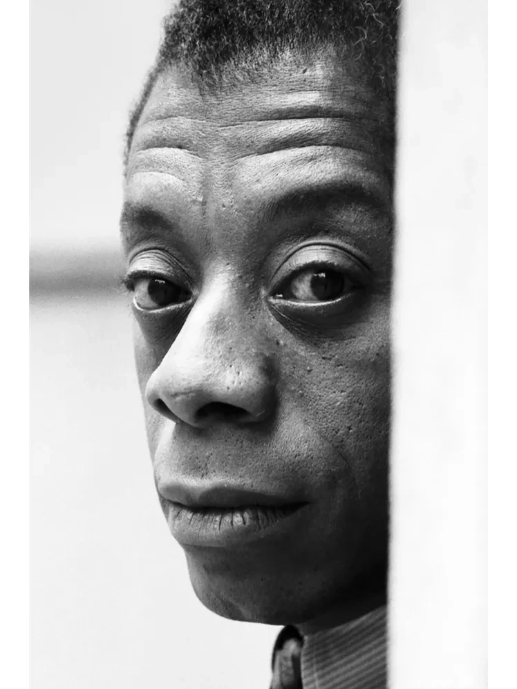 Image may contain: James Baldwin, Face, Head, Person, Photography, Portrait, and Adult