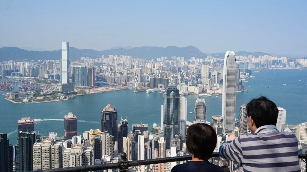 HKEX will reduce the minimum trading spread for about 300 stocks starting Monday. Photo Eugene Lee