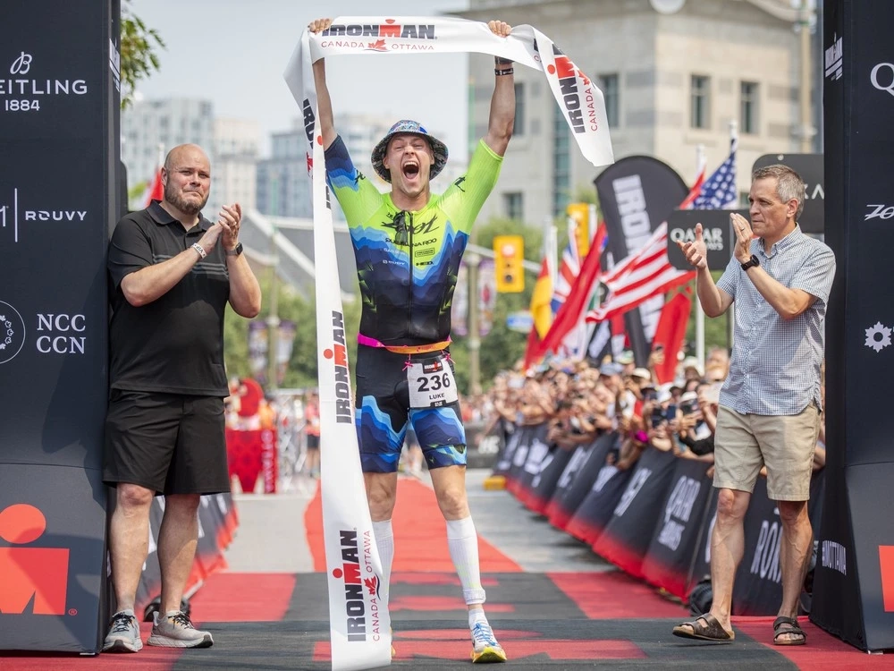 Luke Evans was the first person to cross the finish line Sunday afternoon, finishing the gruelling three-discipline race in 8:40:22. Evans, no stranger to Ottawa, is a Carleton University grad.