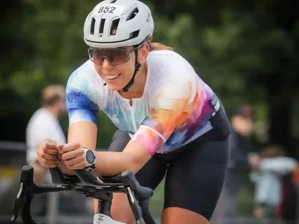 Rebecca Bedard was all smiles during the cycling portion of the race Sunday.