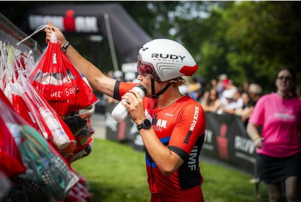 Maxence Trahan in the transition area between the bike ride and the marathon run Sunday.