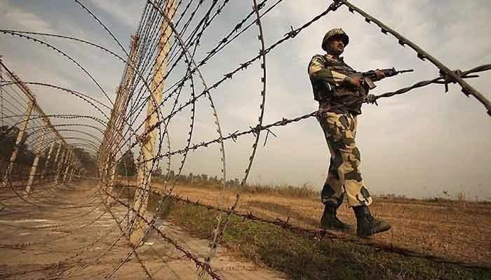 An Indian soldier can be seen standing alongside a barbed wire on the Line of Control. Reuters/File