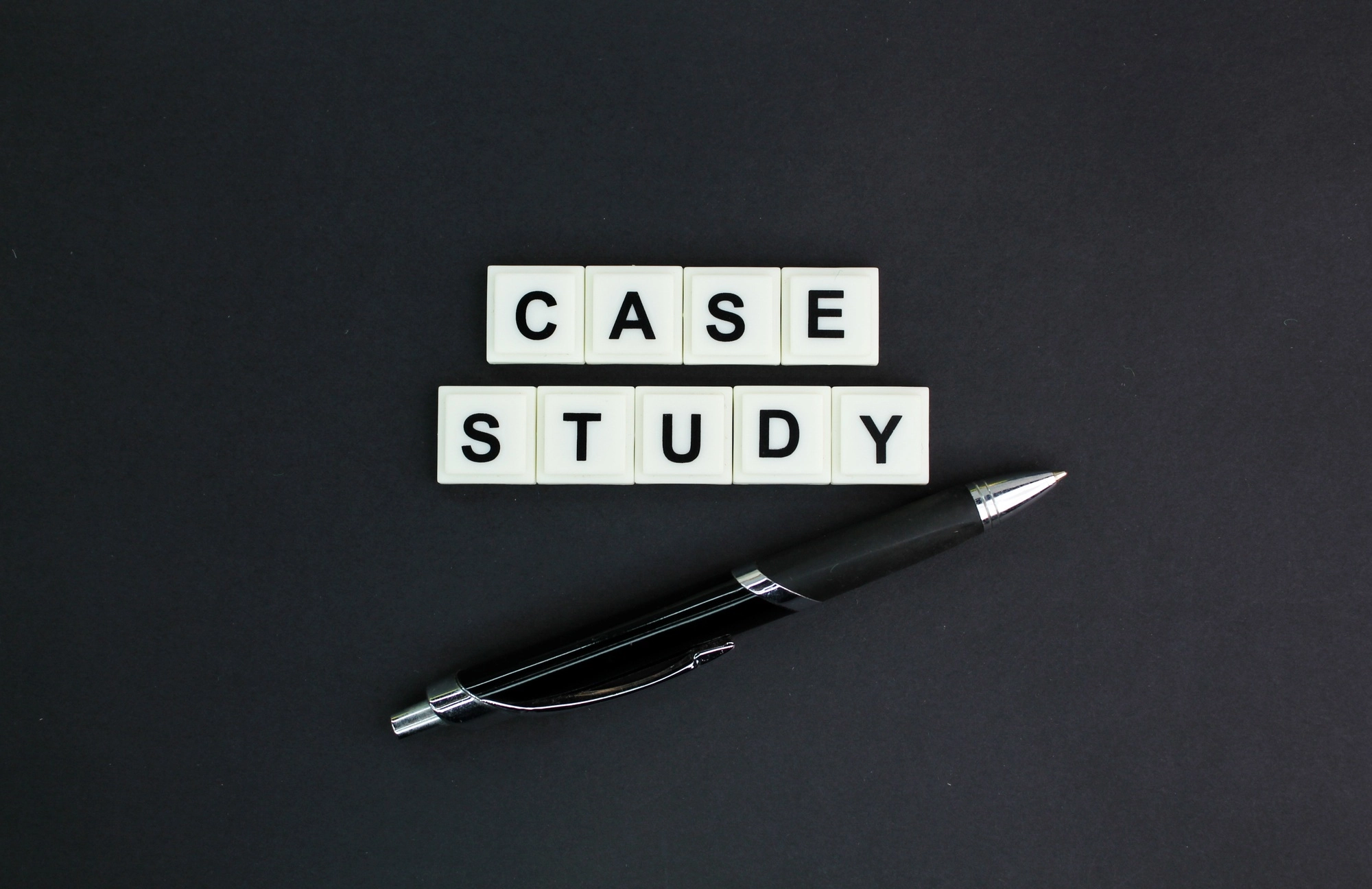 pen and letters of the alphabet with the word case study.