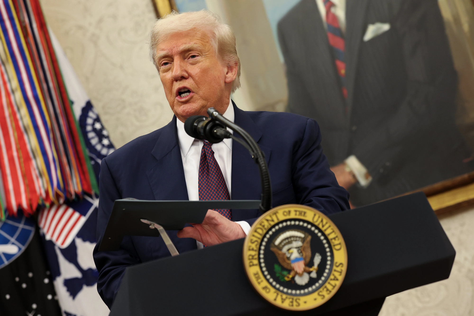 WASHINGTON, DC - AUGUST 06: U.S. President Donald Trump speaks during an event with Apple CEO Tim Cook in the Oval Office of the White House on August 6, 2025 in Washington, DC. Apple Inc. announced a $100 billion investment in manufacturing facilities in the U.S., on top of an announcement in February committing over the next four years to a $500 billion investment in the U.S. economy and the addition of 20,000 new jobs. (Photo by Win McNamee/Getty Images)