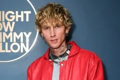 mgk poses backstage at The Tonight Show Starring Jimmy Fallon on Monday, August 4, 2025
