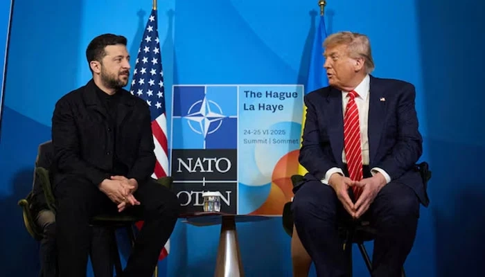 US President Donald Trump and Ukraines President Volodymyr Zelensky attend a meeting at the NATO summit in The Hague, Netherlands June 25, 2025. Reuters