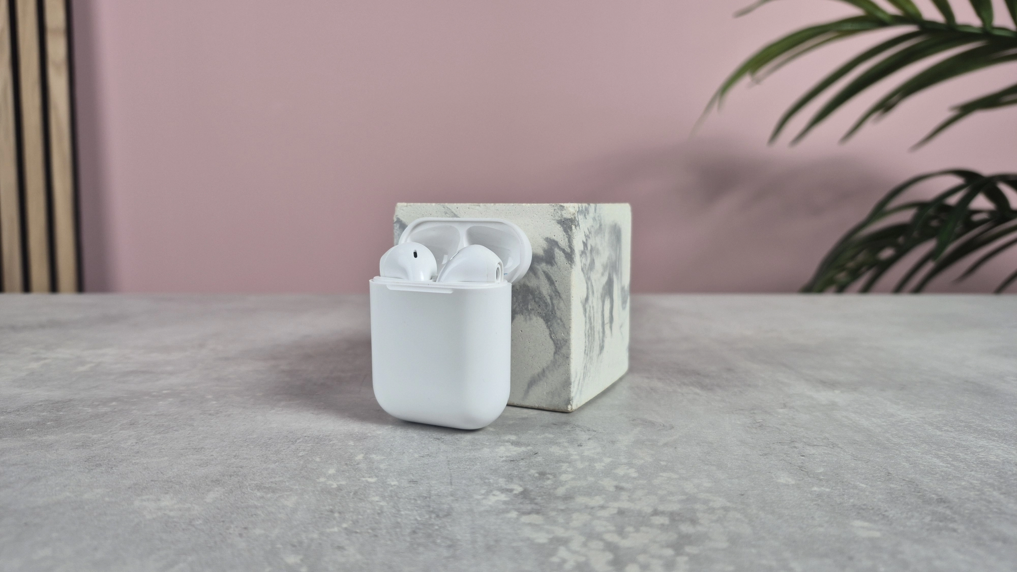 Cheap wireless earbuds balanced against block