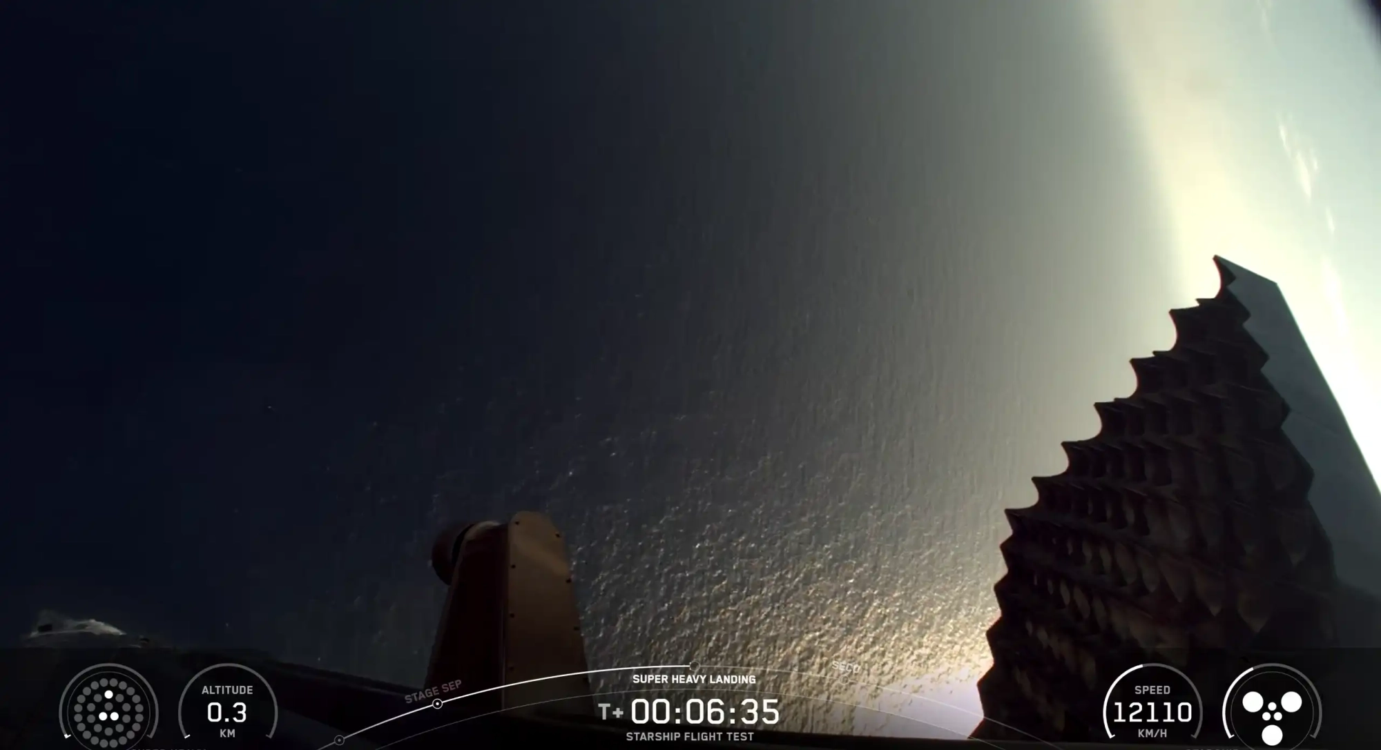 Booster touching down in the ocean.