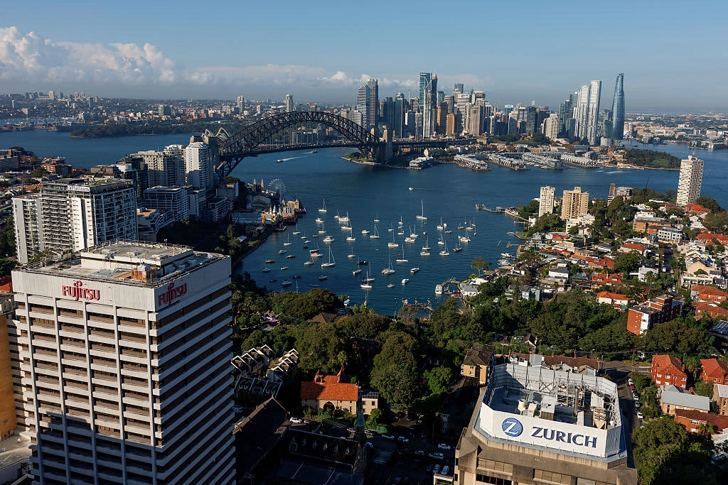 Sydney Harbour and the skyline of the central business district (CBD) in Sydney, Australia, on Tuesday, April 29, 2025. Australian capital city house prices continue to rise, and hotly anticipated interest rate cuts later this year could add further fuel to the fire, leaving some buyers and renters struggling to keep roofs over their heads. Photographer: Brendon Thorne/Bloomberg via Getty Images