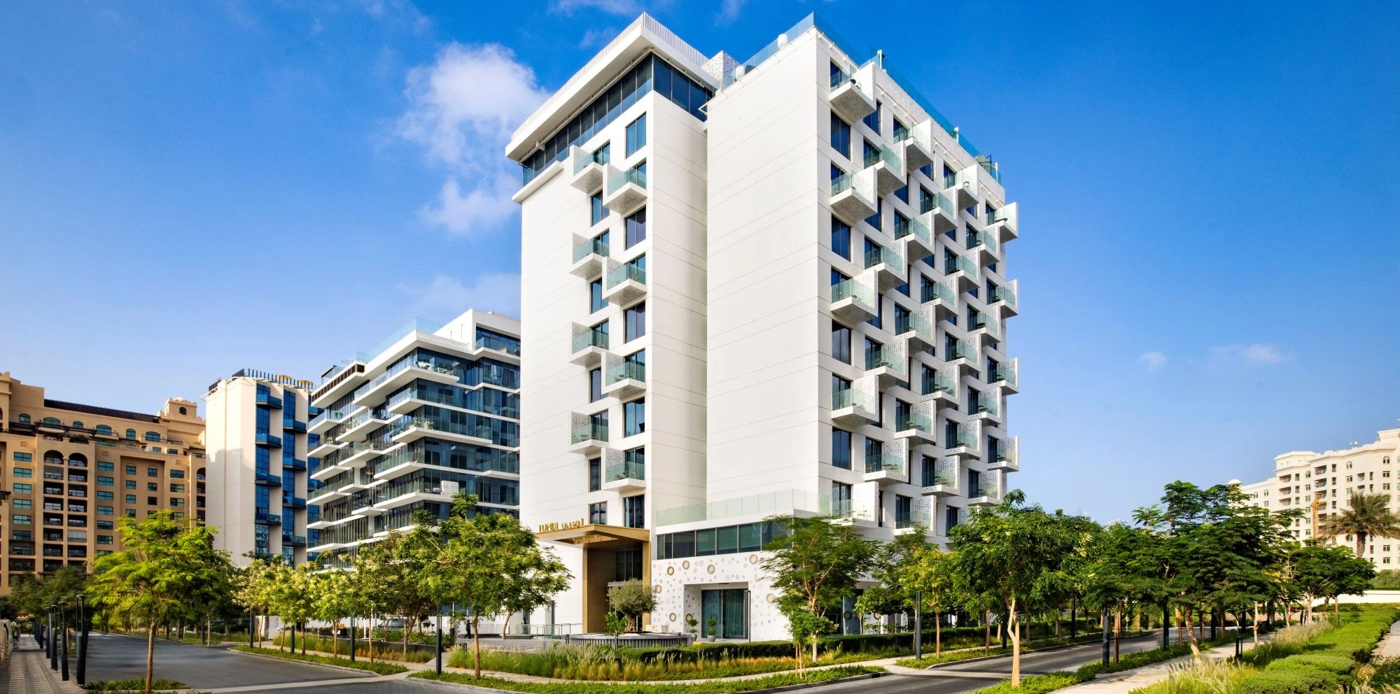 Luxury Hotel on Palm West Beach with Panoramic Views and Hilton Partnership