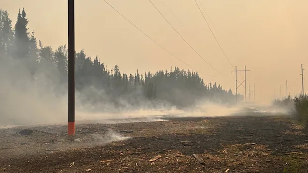 Stranded in Northern Saskatchewan: Wildfire Cuts Off Road to Hamlet