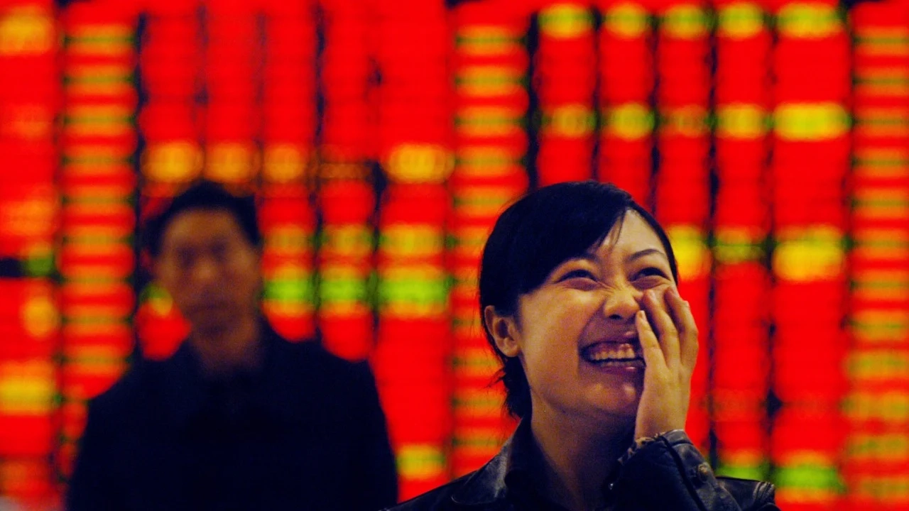 Chinese Stocks Surge to Decade High as Investors Shift to Equities